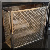 D34. Pottery Barn ”Hartwick” three-panel fire screen in nickel. 30”h x 50”w - $250